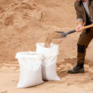 heavy duty sand bags, 50pack 14" x 26", empty sandbags for flooding with tie strings, woven polypropylene sand bag with 1600 hours of uv protection, 50lbs capacity